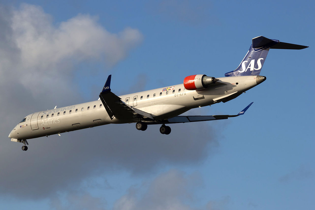An SAS Scandinavian Airlines CRJ900 jet approaches to land.