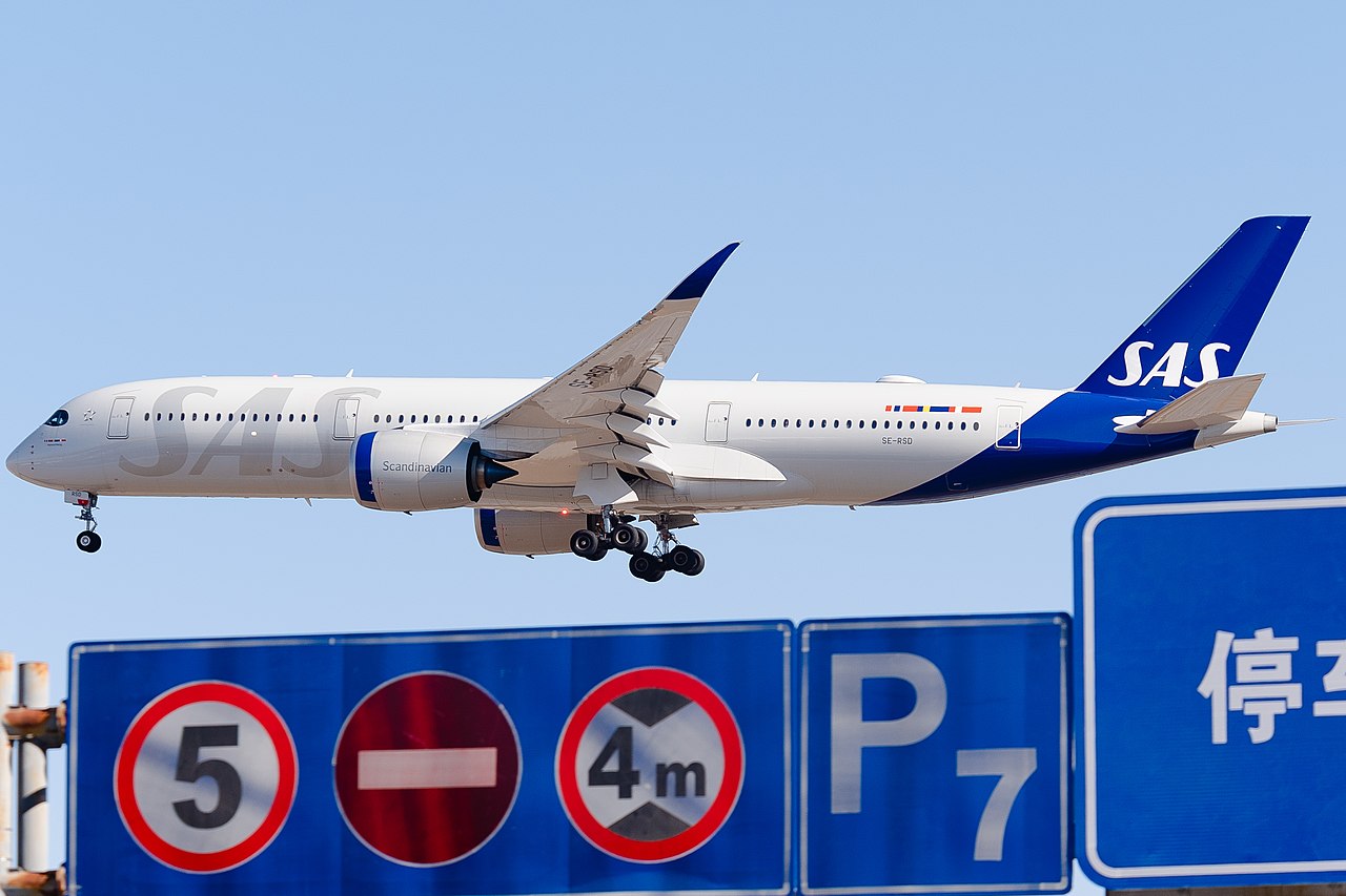 A Scandinavian Airlines Airbus A350 approaches to land.