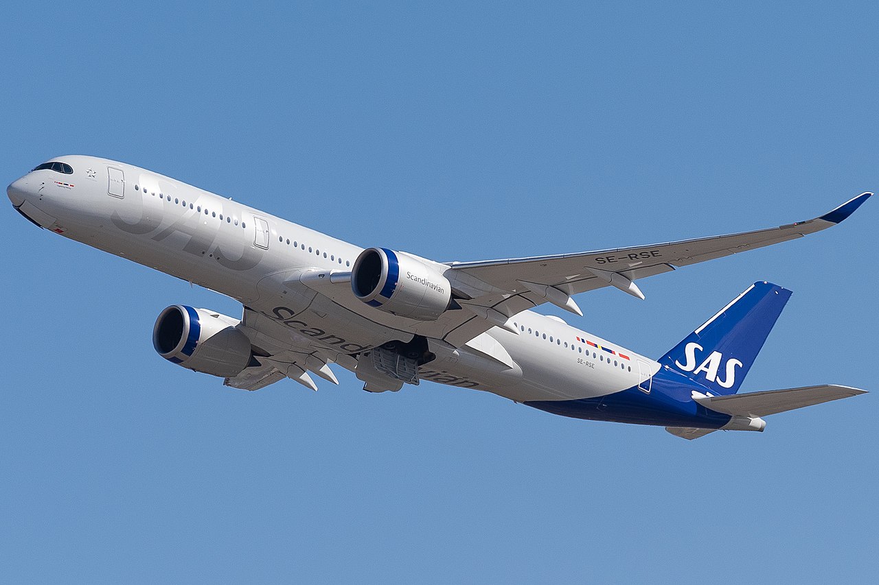 A Scandinavian Airlines Airbus A350 climbs out after takeoff.