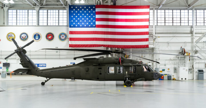 A US Army UH-60M Black Hawk helicopter in the hangar.
