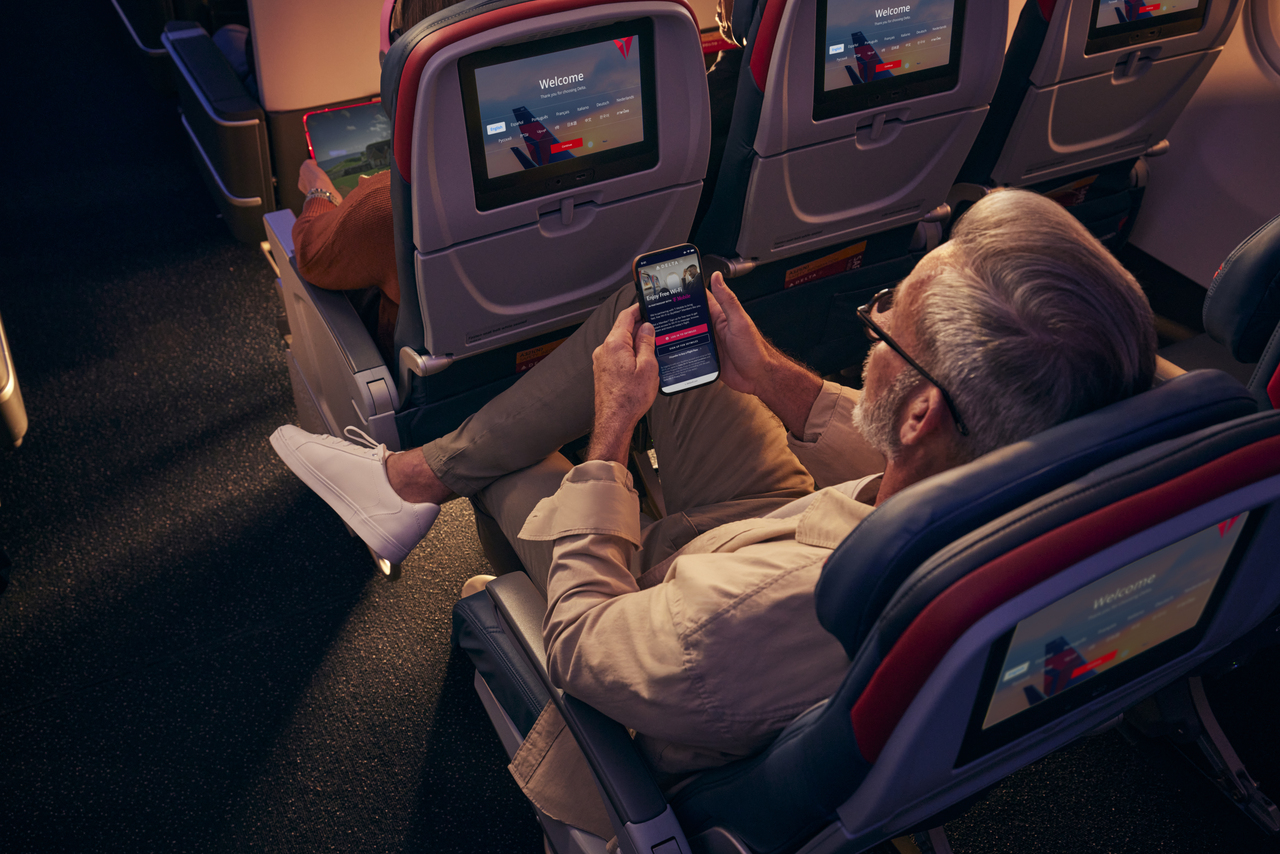 A Delta Air Lines passengers uses Wi-Fi connection in flight.