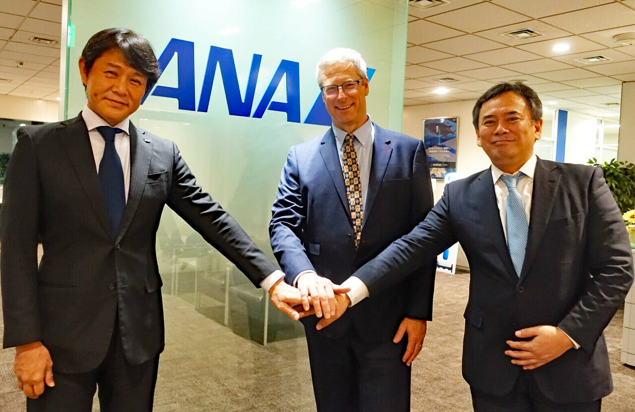 Officials of All Nippon Airways (ANA) and Raven SR shake hands on new sustainable aviation fuel (SAF) deal.