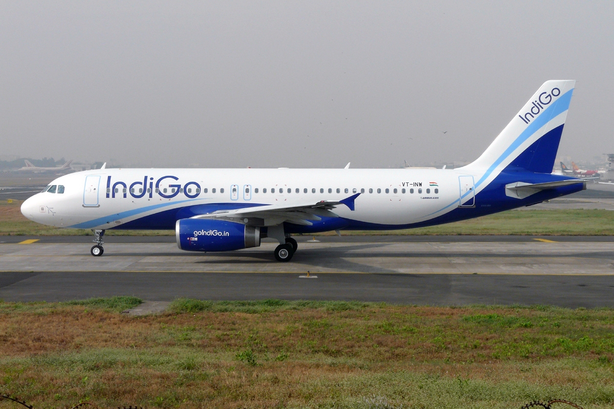 An IndiGo Airbus on the taxiway.