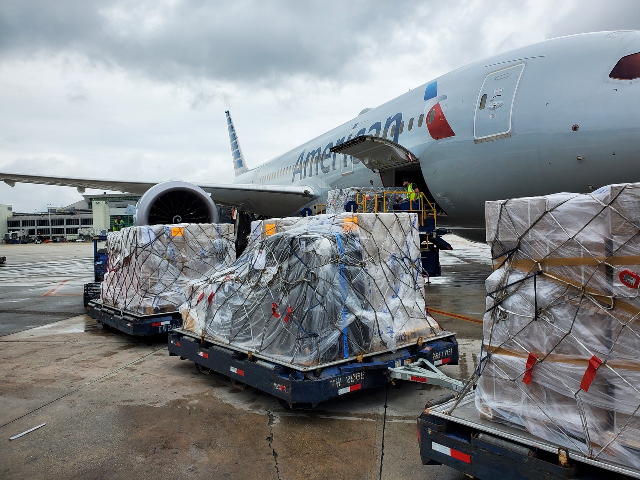 An American Airlines Cargo aircraft is loaded with supplies bound for Haiti