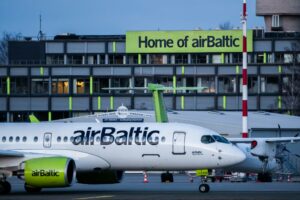 An airBaltic aircraft on the tarmac.