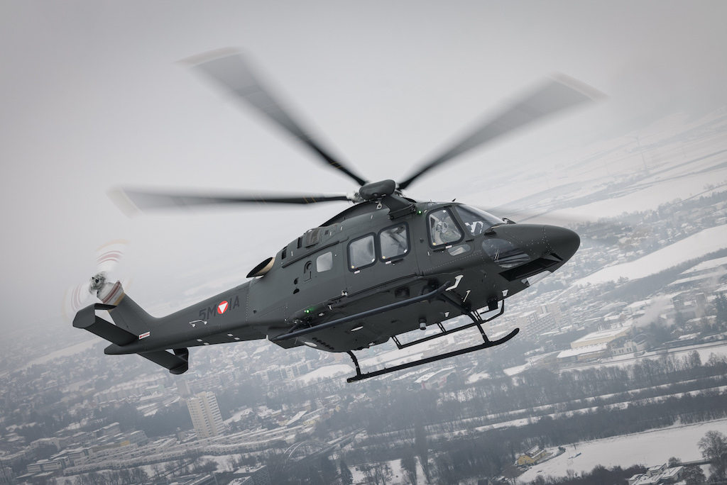 A Leonardo AW169M helicopter banks in flight.