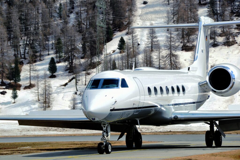 A private jet taxis for takeoff.