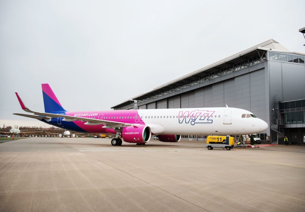 A Wizz Air Airbus A321neo outside the hangar.