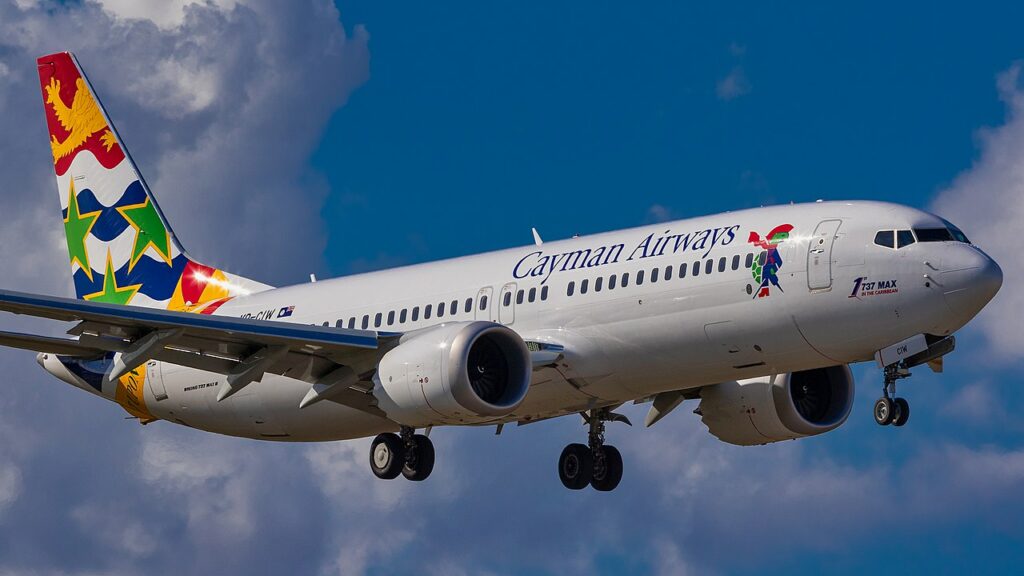 A Cayman Airways Boeing 737 approaches to land.