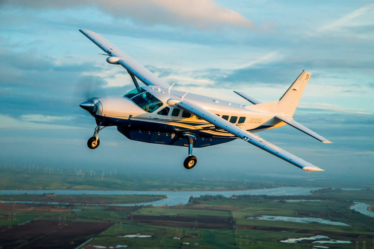 A Cessna Grand Caravan in flight, destined for M-Landarch Airlines