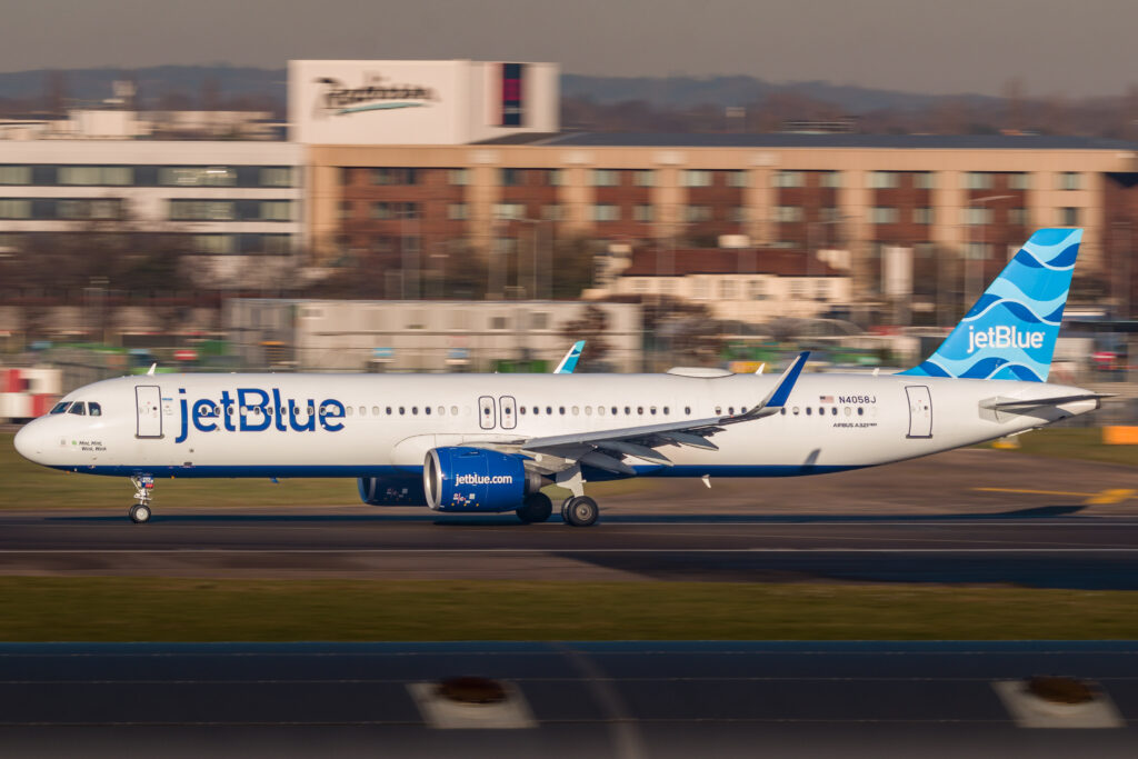 A JetBlue aircraft on the taxiway.