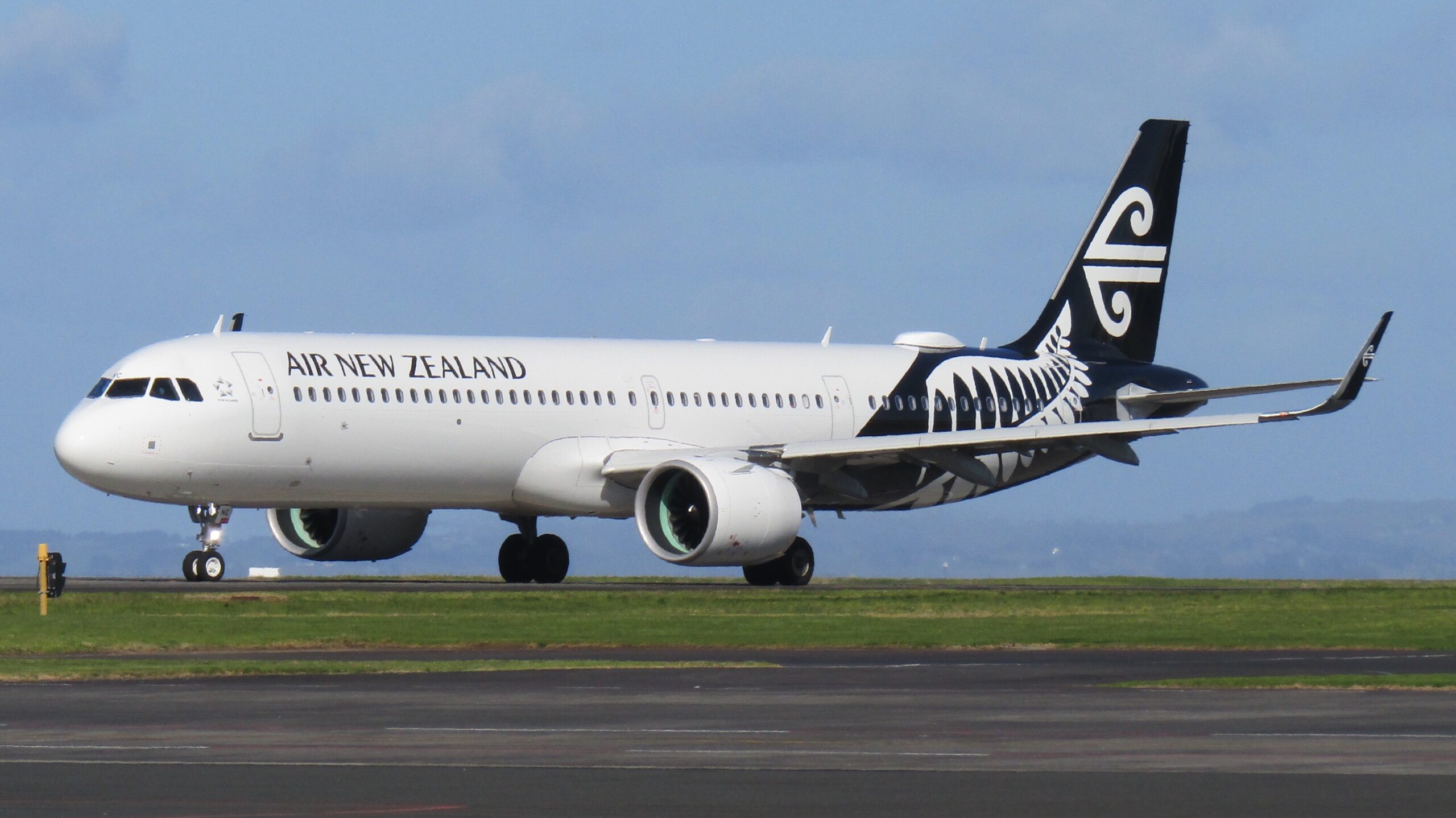 An Air New Zealand Airbus on the runway.