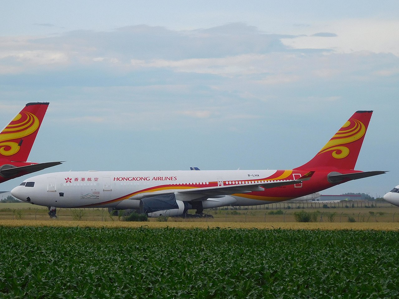 A Hong Kong Airlines A330 parked.
