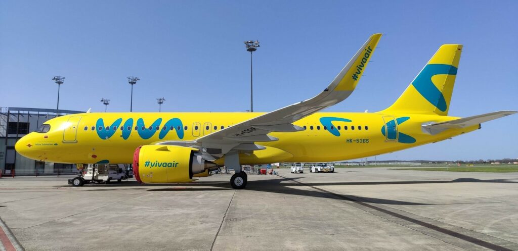 A Viva Air Airbus A320neo parked on the tarmac.