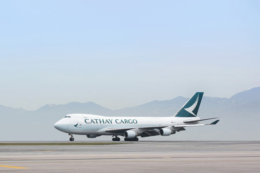 A Cathay Cargo Boeing 747 freighter aircraft on the runway.