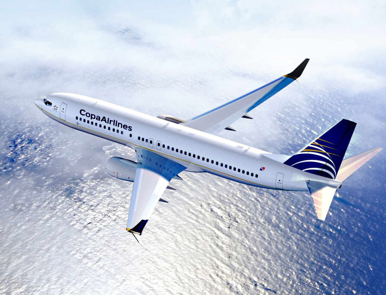 A Copa Airlines Boeing 737 in flight over water.
