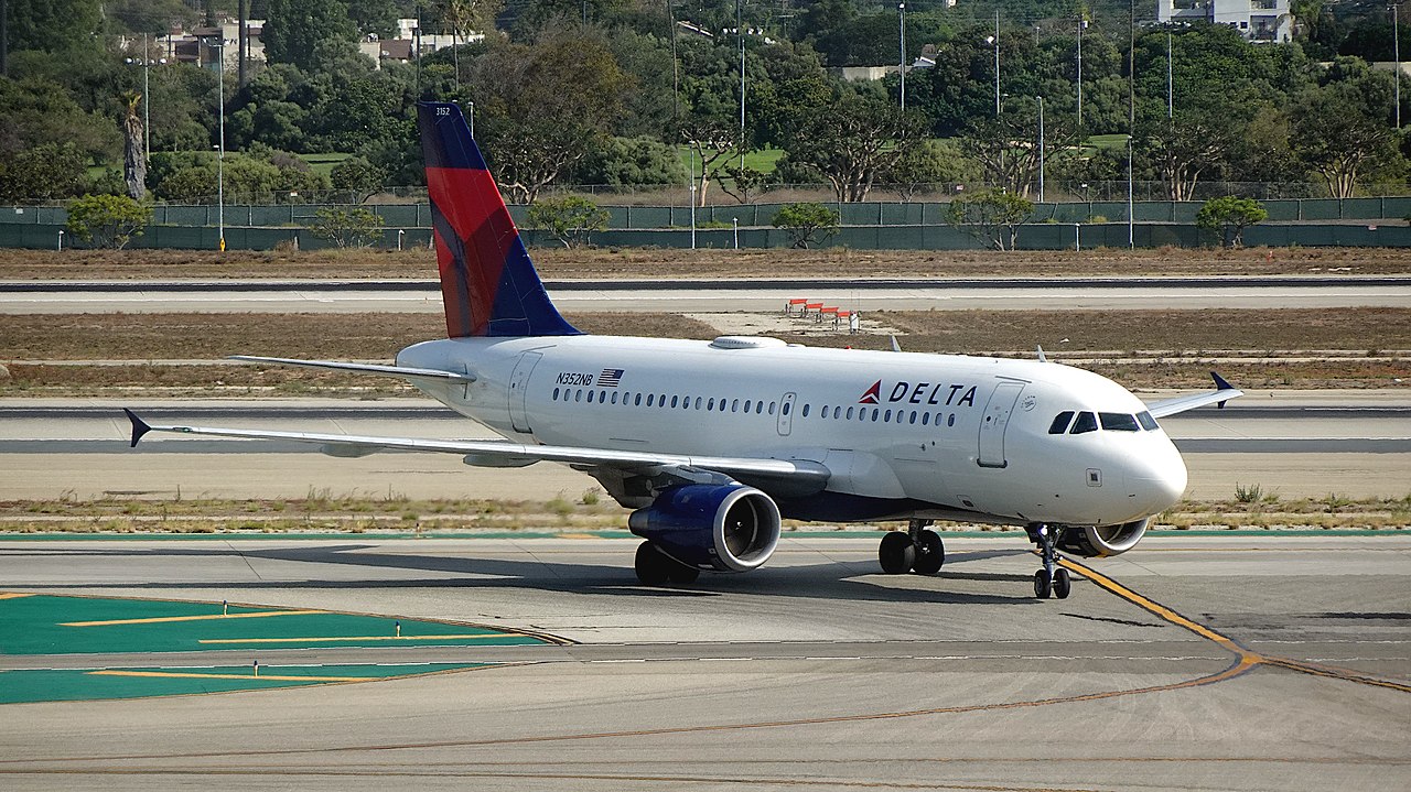 A Delta Air Lines Airbus A319 enters the runway.