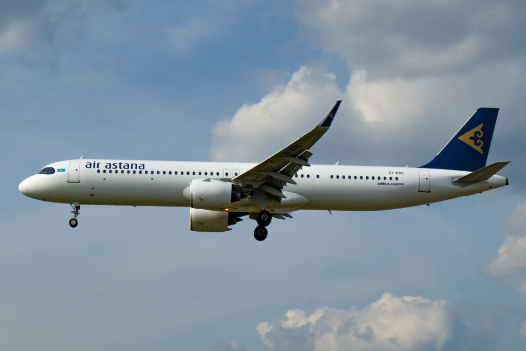 An Air Astana aircraft approaches to land.