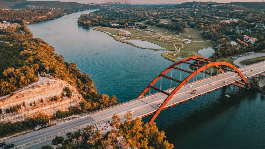 Aerial photo of Pennybacker Bridge and Austin, Texas.