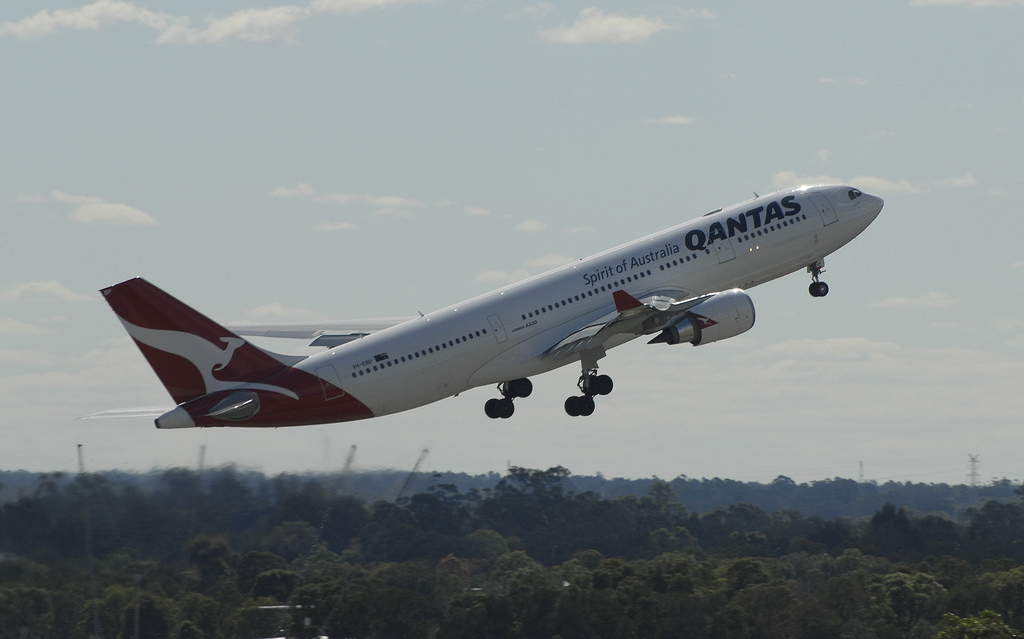 A Qantas A330 climbs after takeoff.