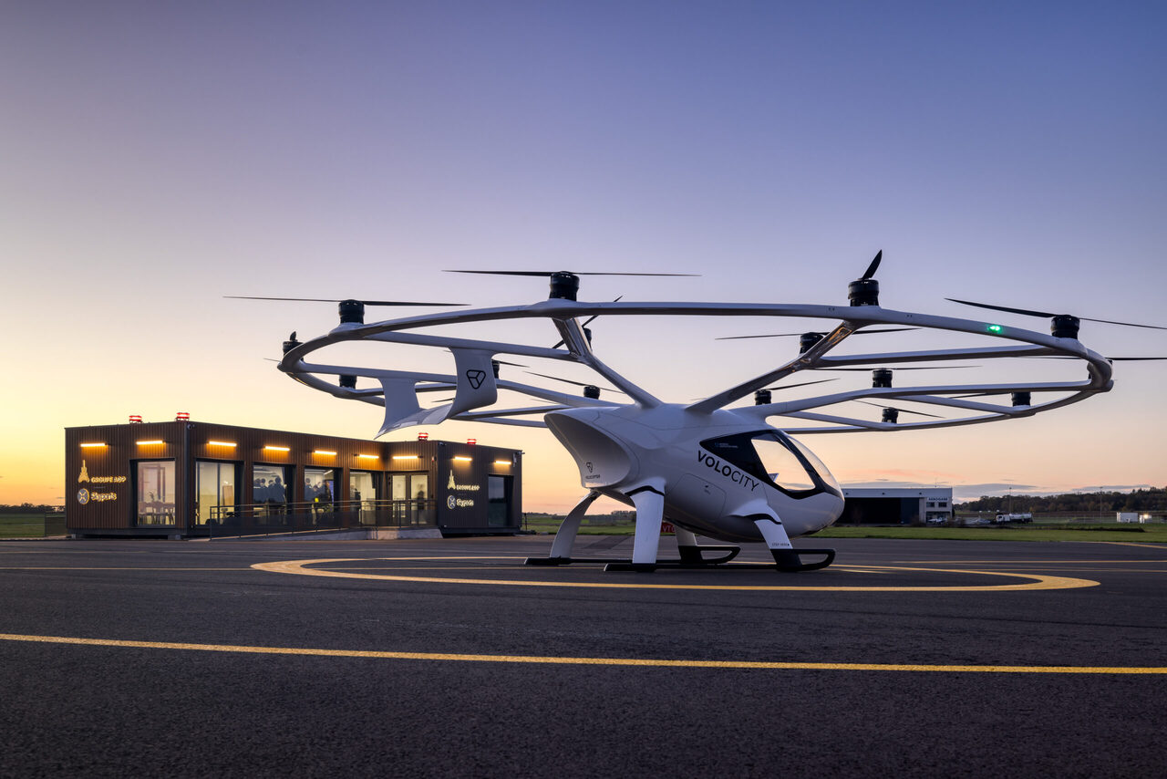 Render of a Volocopter eVTOL aircraft parked on a Vertiport.