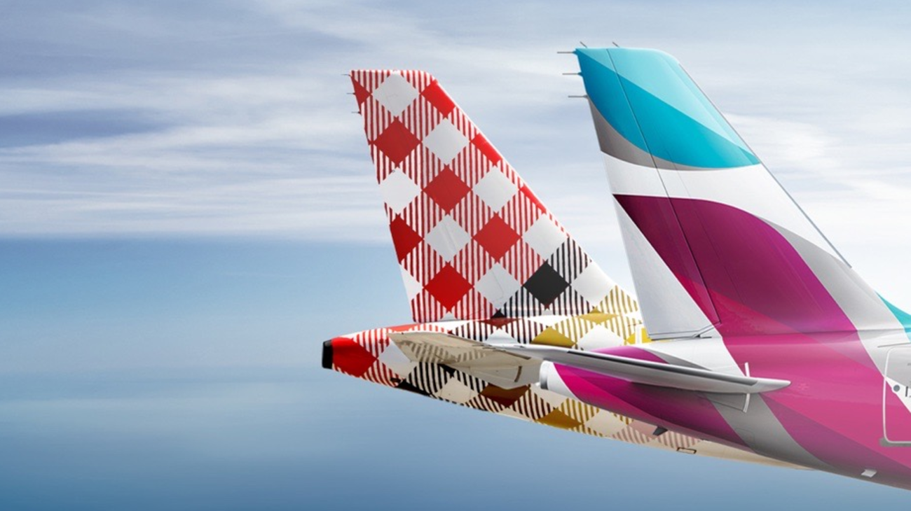 Tailplanes of Eurowings and Volotea aircraft together.