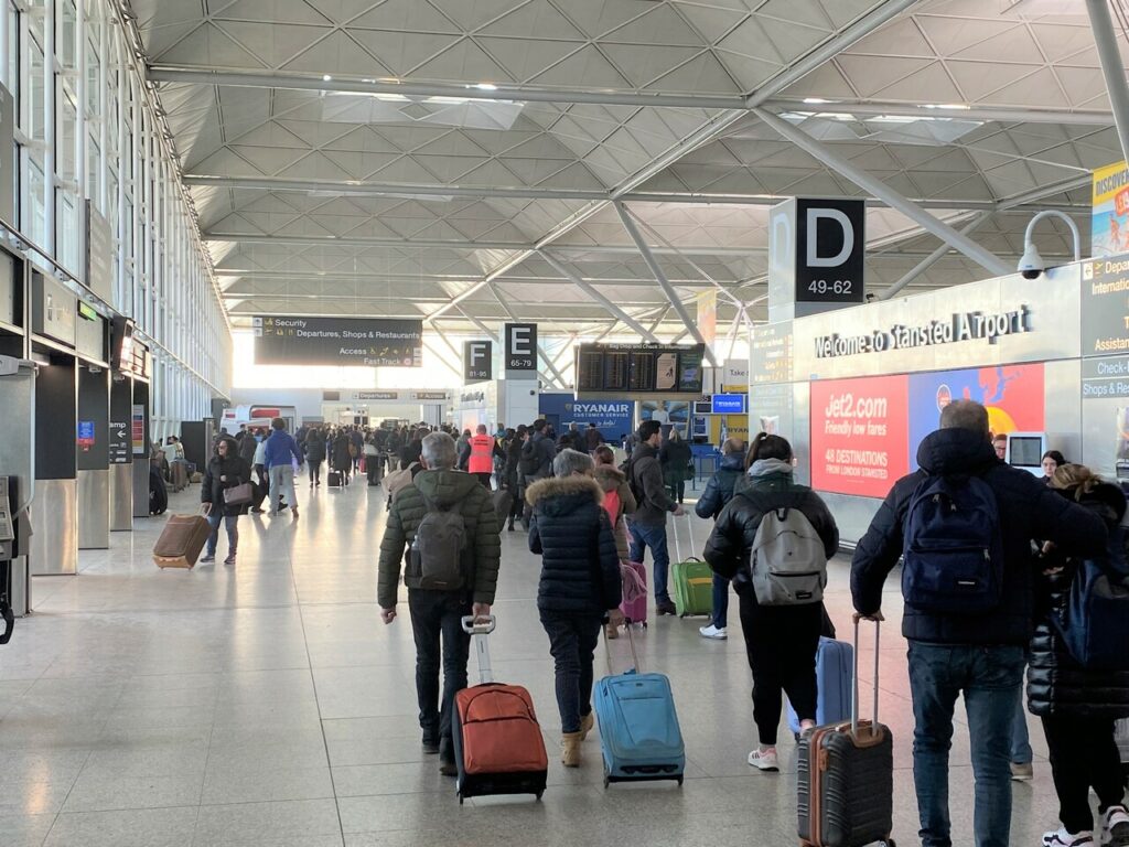 Passengers in the London Stansted Airport terminal.
