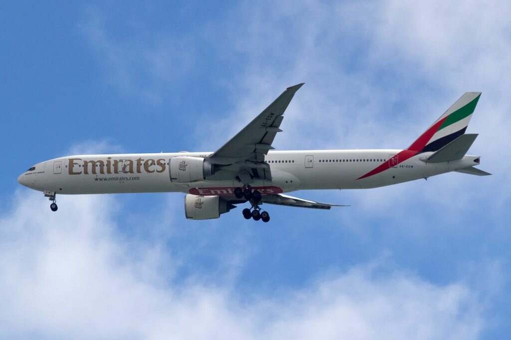 An Emirates Boeing 777 approaches to land.