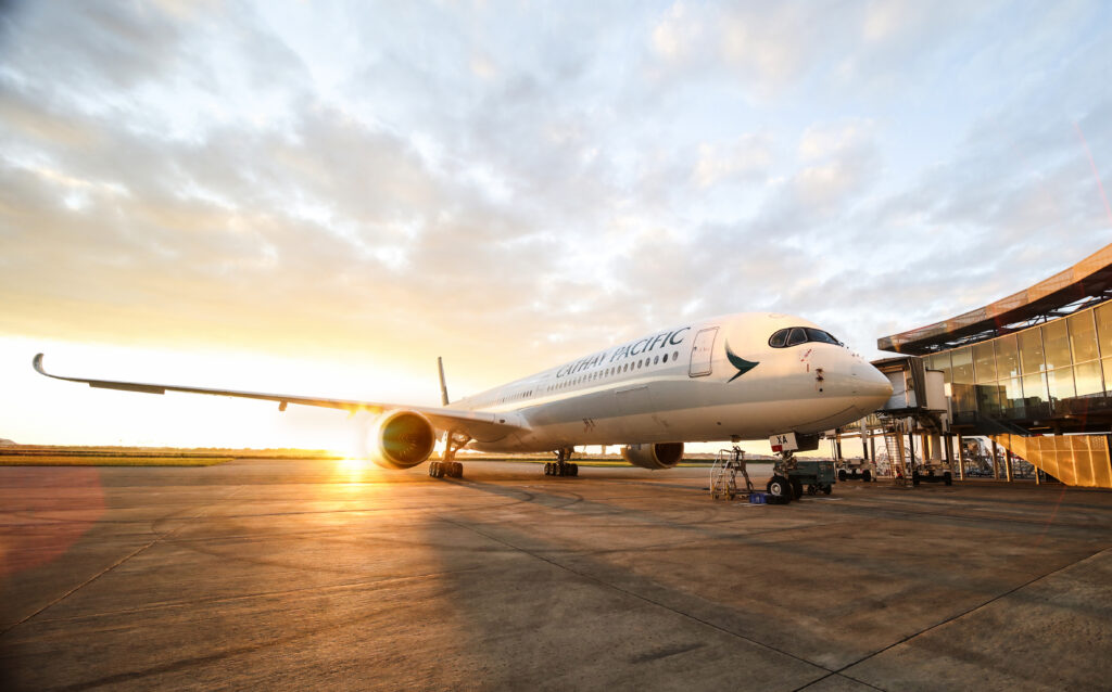 A Cathay Pacific Airbus A350 at the terminal.