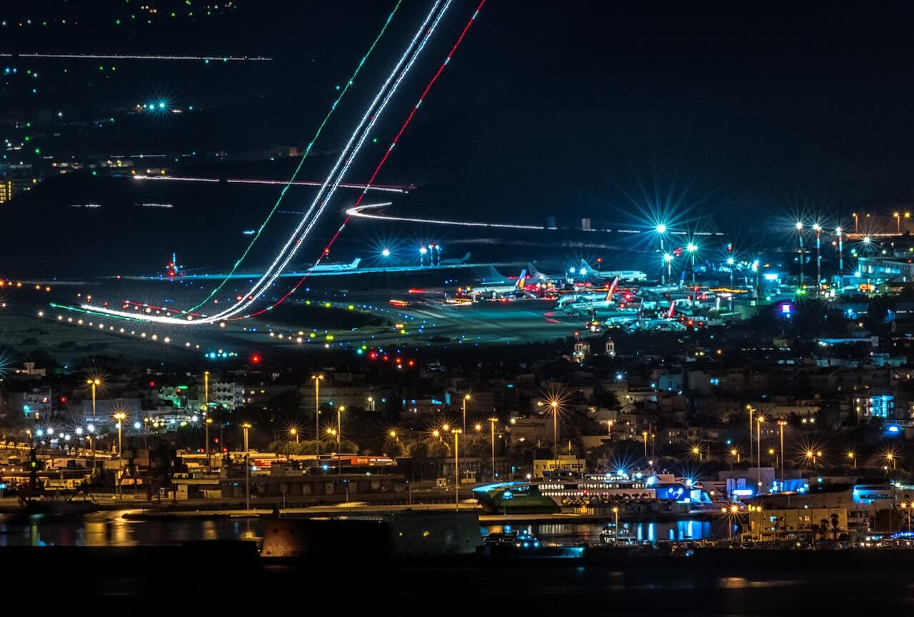 An airport at night.