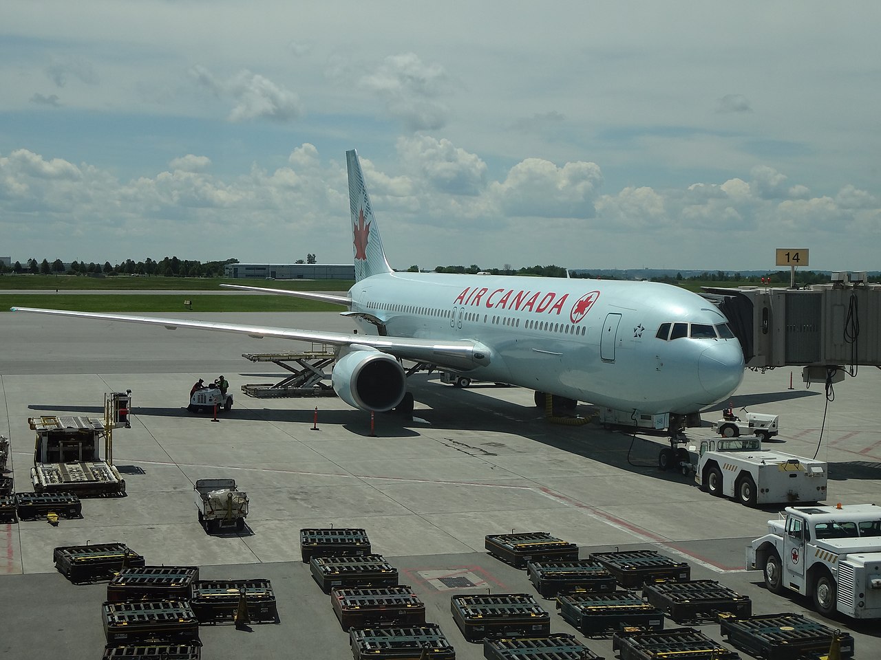 An Air Canada aircraft being loaded.