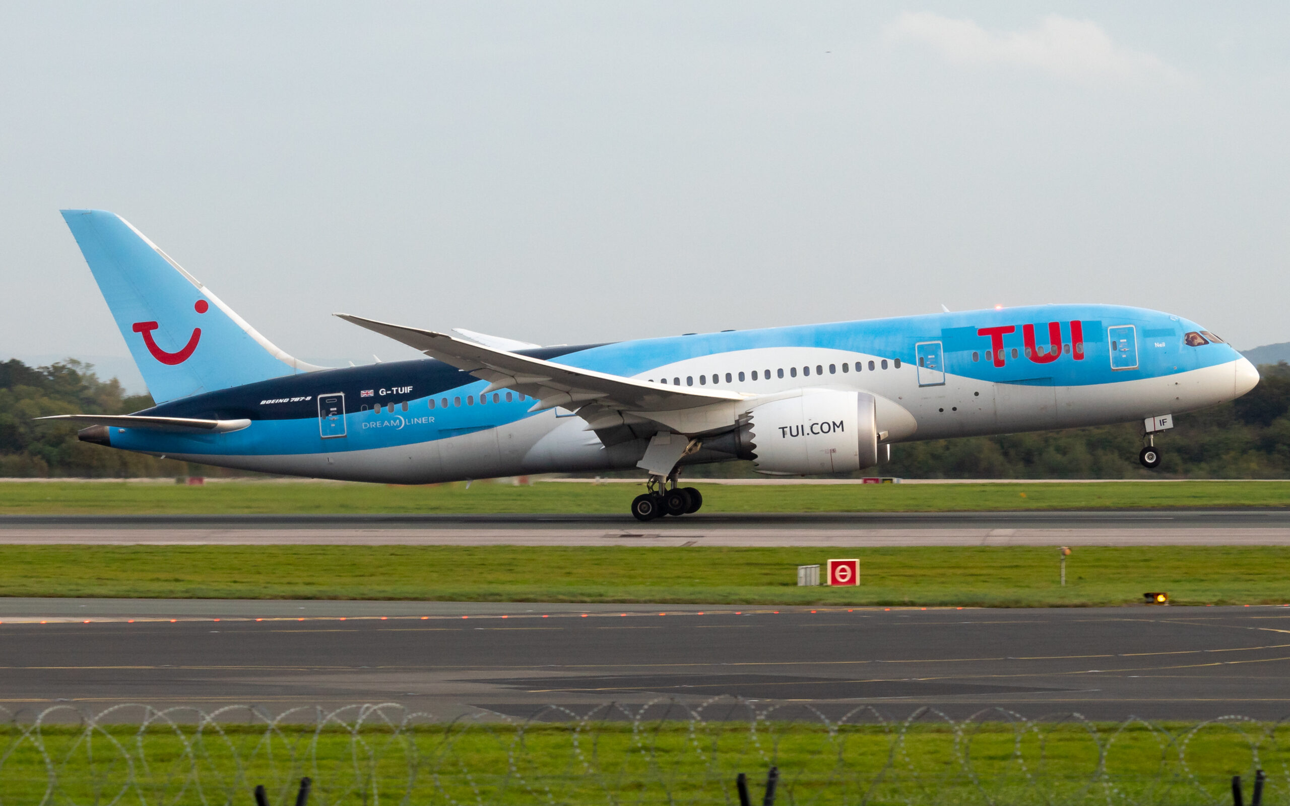 A TUI Boeing climbs after takeoff.