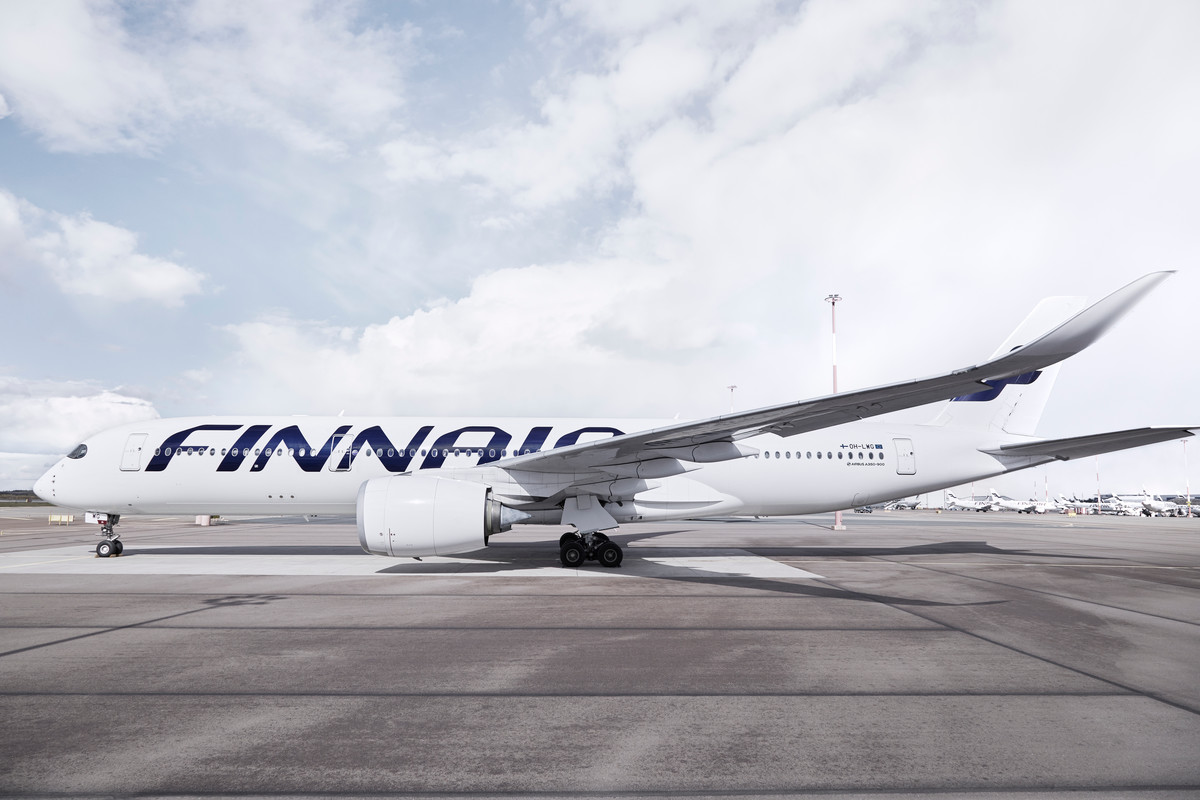A Finnair Airbus A350 parked on the apron.