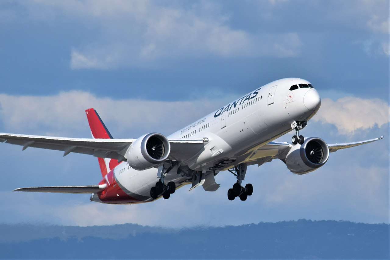 A Qantas Dreamliner departs Adelaide.