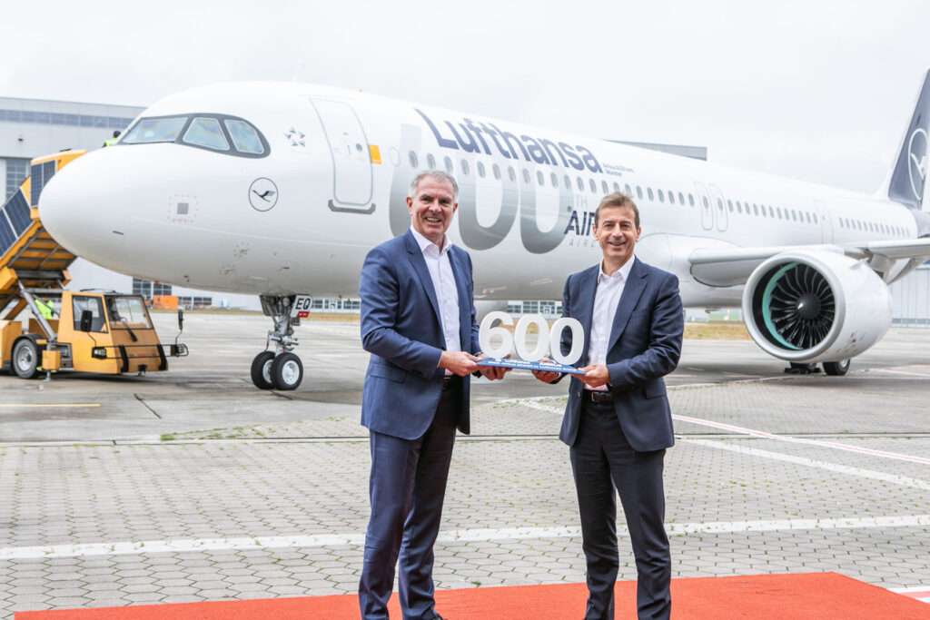 CEO's of Lufthansa and Airbus celebrate the delivery of the 600th Airbus aircraft.