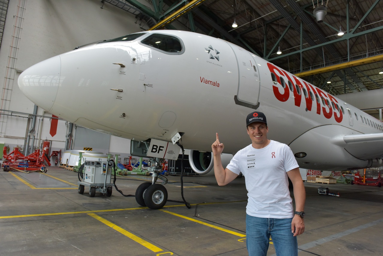 The SWISS Airbus A220 named Viamala parked in the hangar.