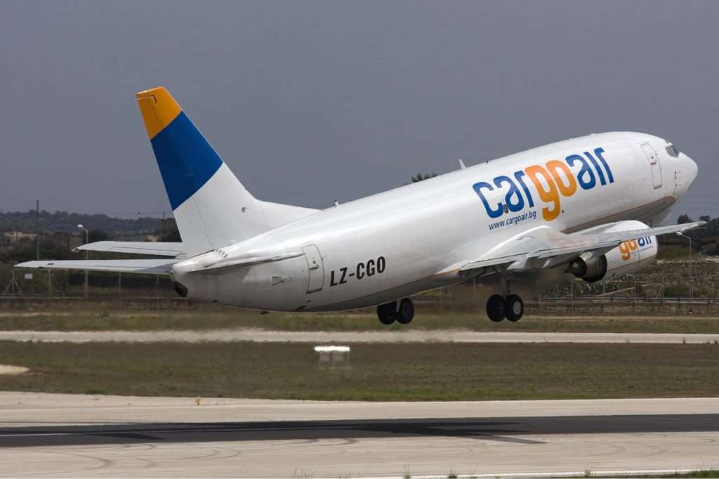 A Cargo Air Boeing 737 freighter takes off.