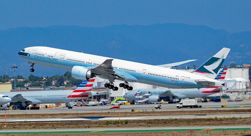 A Cathay Pacific Boeing 777 takes off from LAX Airport.
