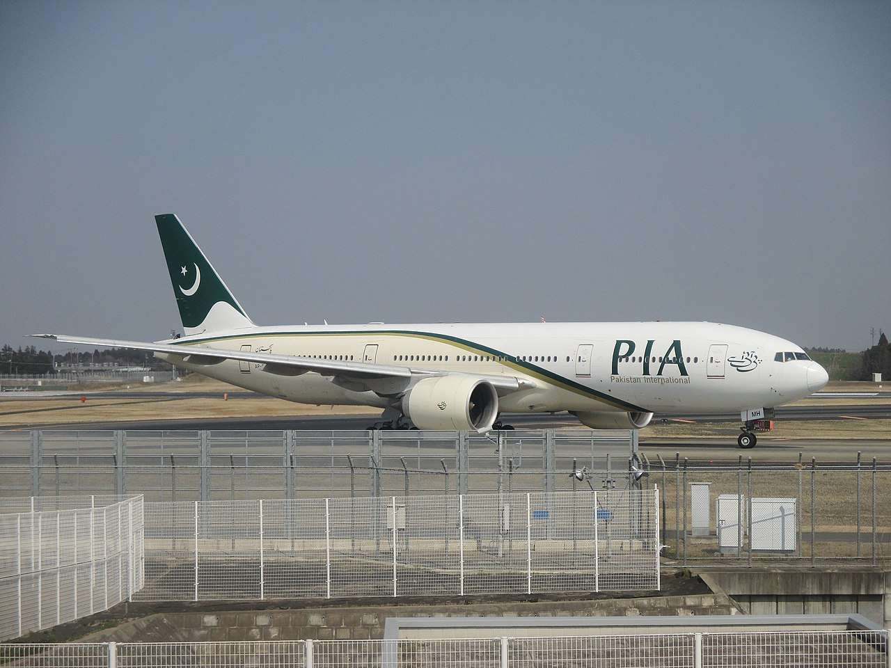 A Pakistan International Airlines (PIA) Boeing 777-200ER on the tarmac.