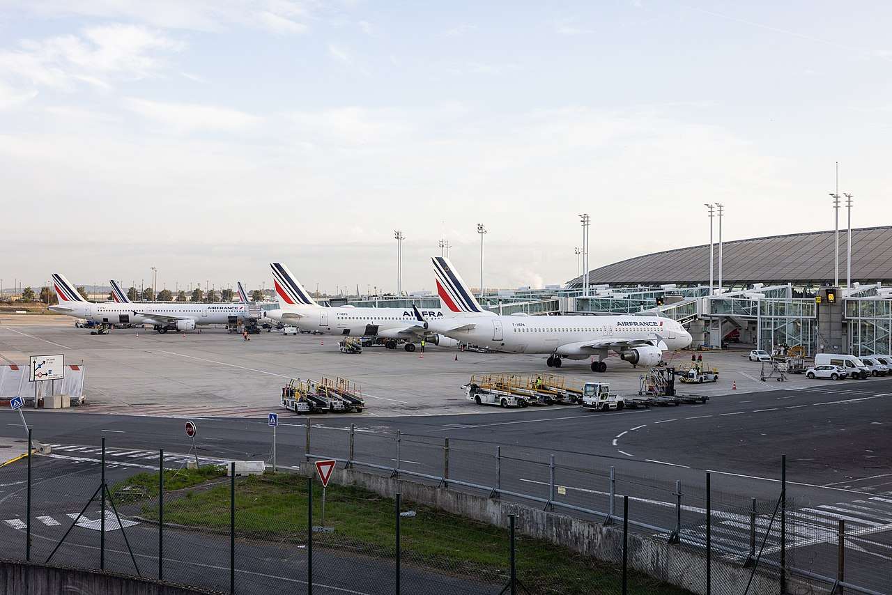 Air France aircraft parked at terminal Charles de Gaulle airport.