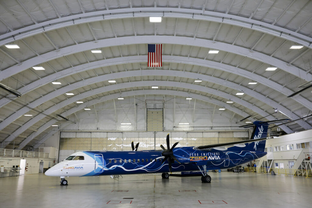 An Alaska Airlines Q400 aircraft in the ZeroAvia hangar for conversion.