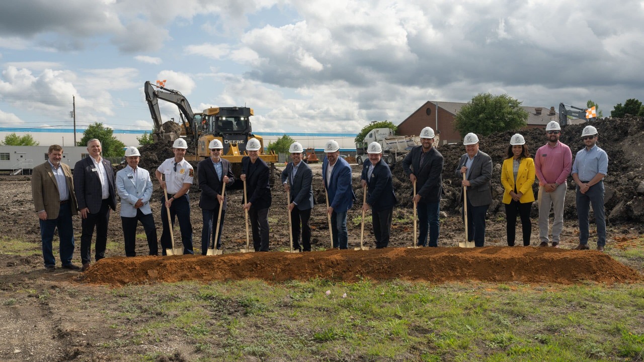 Cirrus Aircraft staff break ground for new airport facility.