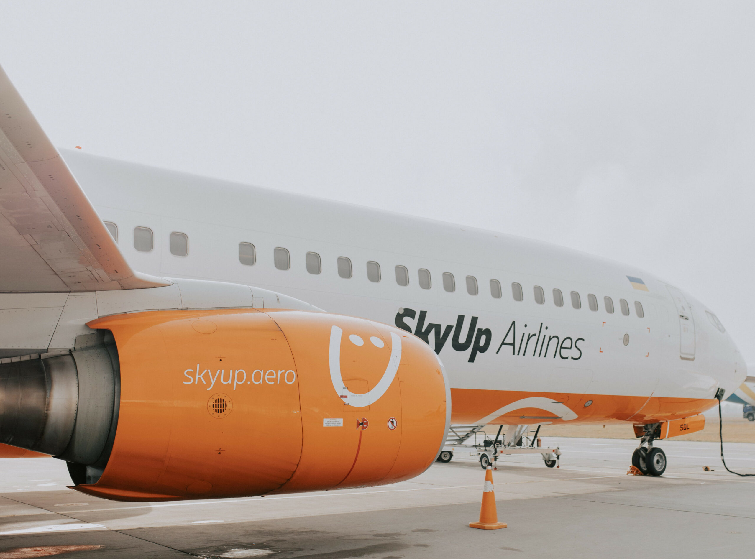 Close-up of a SkyUp Airlines aircraft on the tarmac.