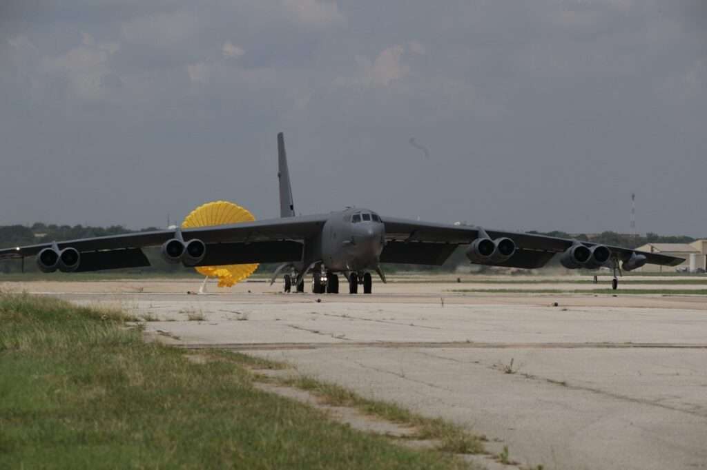 A B-52 Stratofortress lands at the Boeing factory.