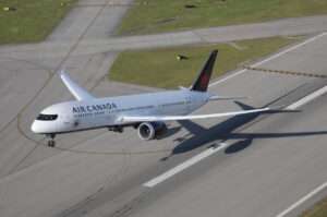 Aerial view of an Air Canada Boeing 787 Dreamliner taking off.