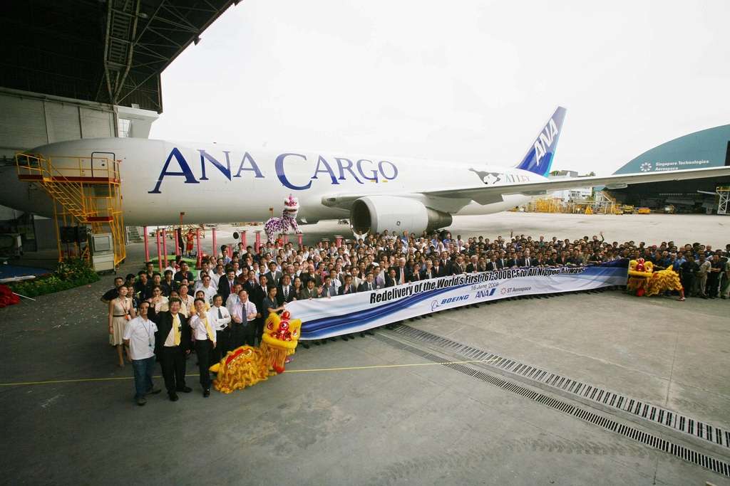 ANA Cargo staff celebrate first Boeing Converted Freighter 797-300BCF.
