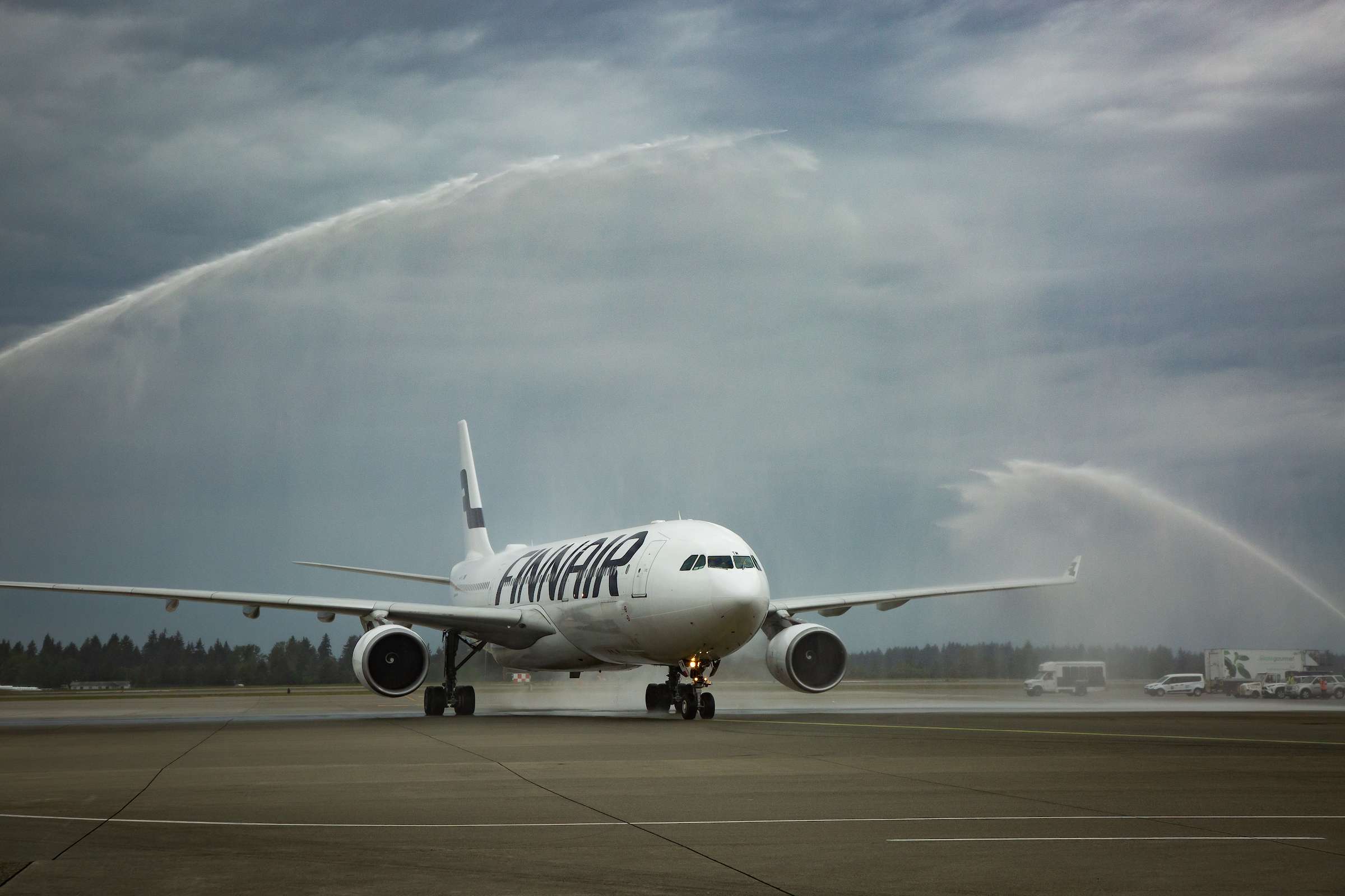 A Finnair Airbus is given a water cannon salute in Seattle.