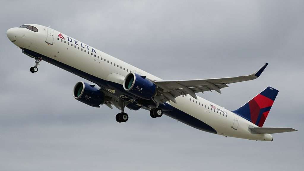 A Delta Air Lines A321neo climbs after takeoff.