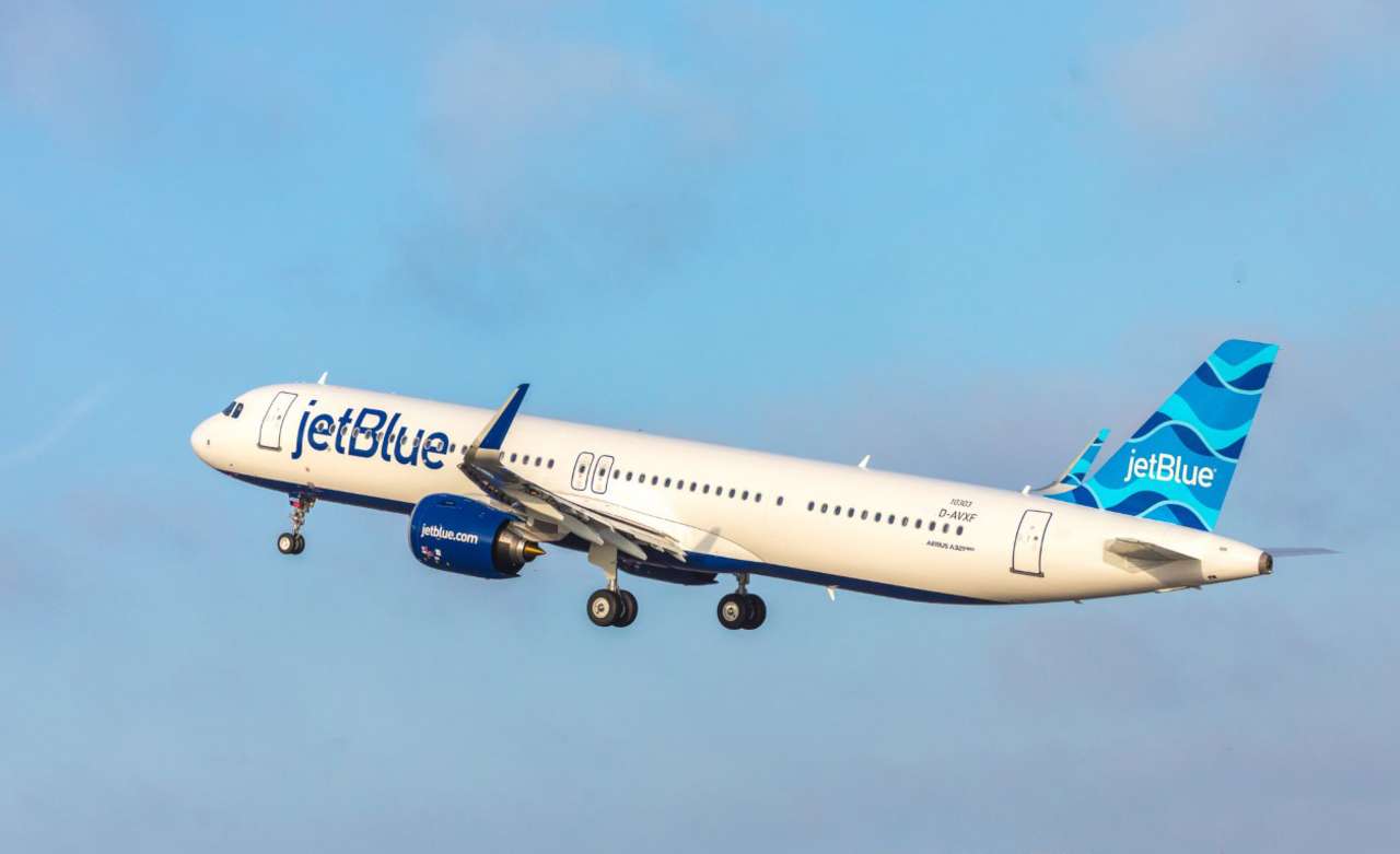 A JetBlue A321neo climbs after takeoff.