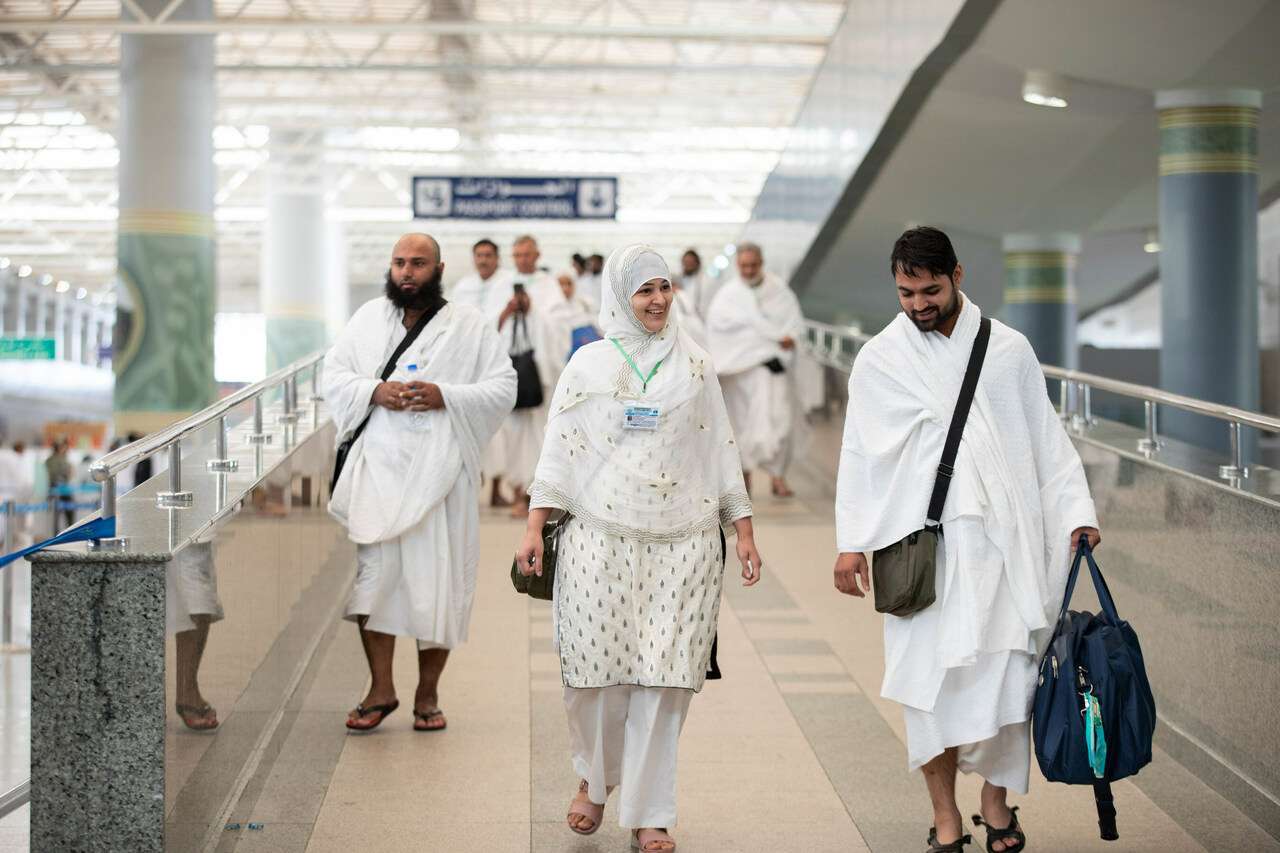 Foreign pilgrims arrive to Saudi airport before performing Hajj.